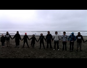 Activists participating in Hands Across The Sand during the 2013 Clean Water Classic in Westport